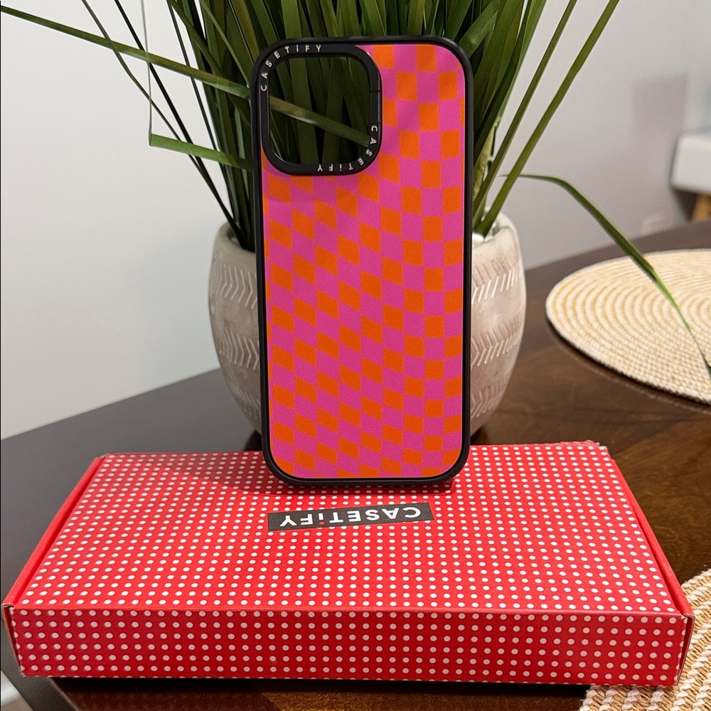 Casetify Vibrant Pink and Orange Checkered Case with stand iPhone 16 Pro Max